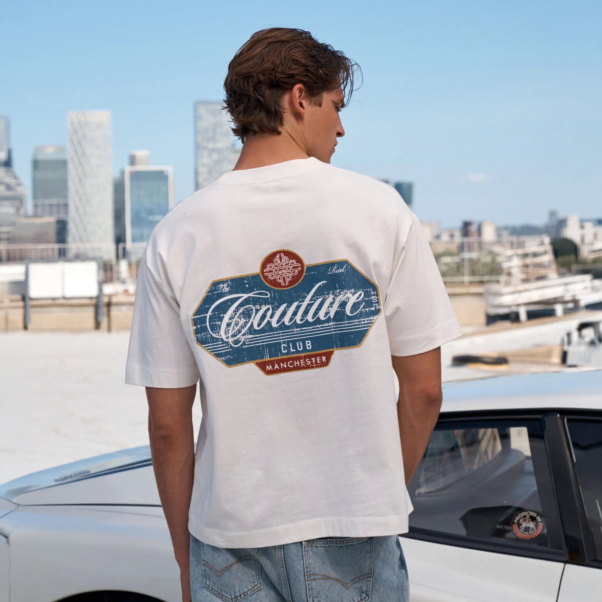 Model View of The Couture Club Vintage Script Graphic Off White T-Shirt